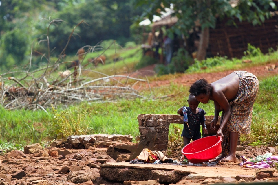 When clean water is so sparse the luxury of washing clothes in clean water is simply not an option.  This lady and her child wash the family clothes at the village water supply.