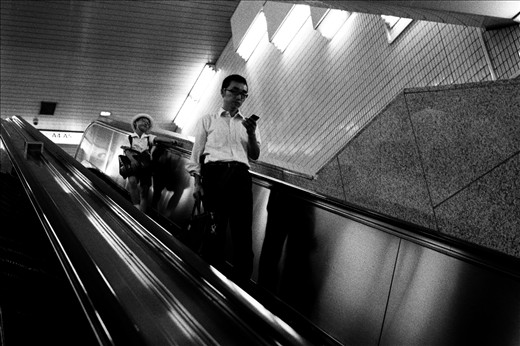 The bored schoolboy and occupied businessman are a clear picture of the mundane routines that have become synonymous with life.