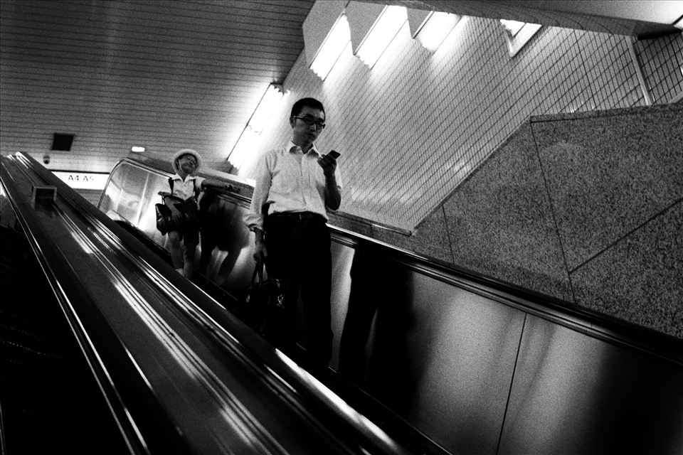 The bored schoolboy and occupied businessman are a clear picture of the mundane routines that have become synonymous with life.