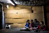 Abu Khamis helps his daughters with the Arabic homework for the next day. The family lives in one of the small villages that are at risk of demolition.: by ulrikhasemann, Views[515]