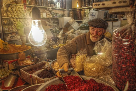 His name is Amir. All life he worked on local bazaar, selling food for people.