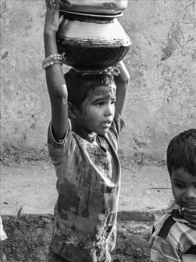 By the sweat of his brow, Gaurav carries the water to help his family.
It's not an easy life. You can see the most beautiful and the hardest situations in modern India.