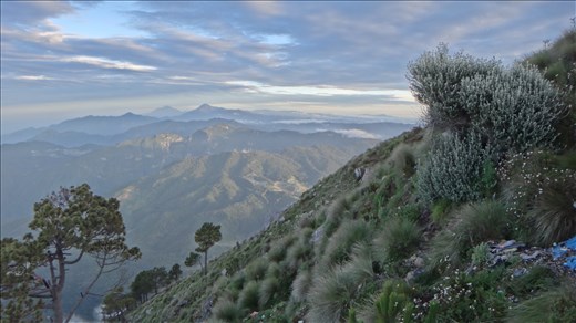 Peering North into Mexico from Santa Maria Volcano at sunrise. (Guatemala)