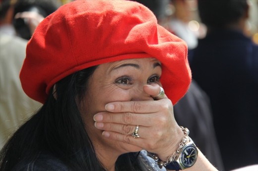 Woman in red boinas, Día de la Tradición