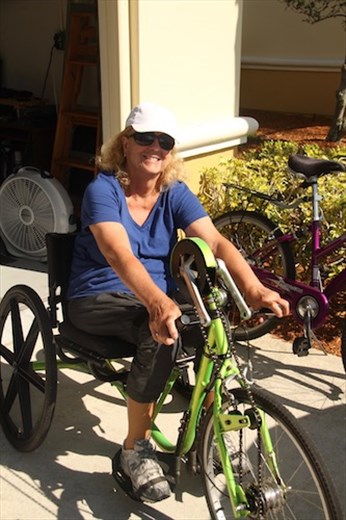 Lois on her hand bike