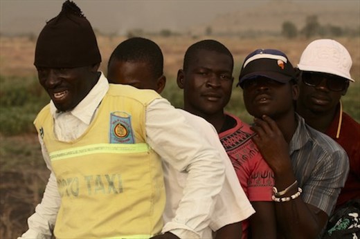 Five men on a motorbike