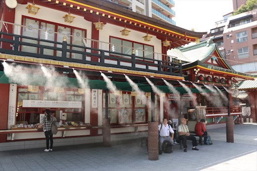 Cooling mist on a hot day, Kandi Myojin Shinto shrine