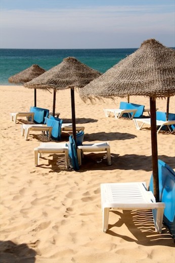 Salema's white sand beaches and cold water, Algarve