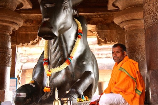 Monk and bull, Pattadakal Complex