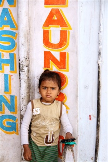 Little girl outside the laundry, Udaipur