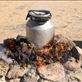 Two goats in milk can pressure cooker on horse poop fire, Ikh Nart Nature Reserv Views[748]