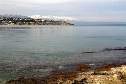 Snow-capped mountains and harbor, Rethymno