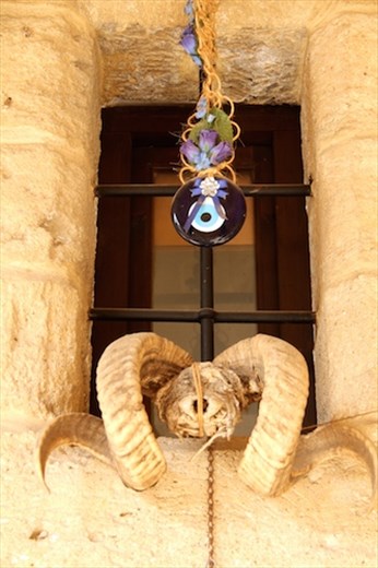 Evil eye and mouflon horns, Buyak Han caravansary, North Nicosia