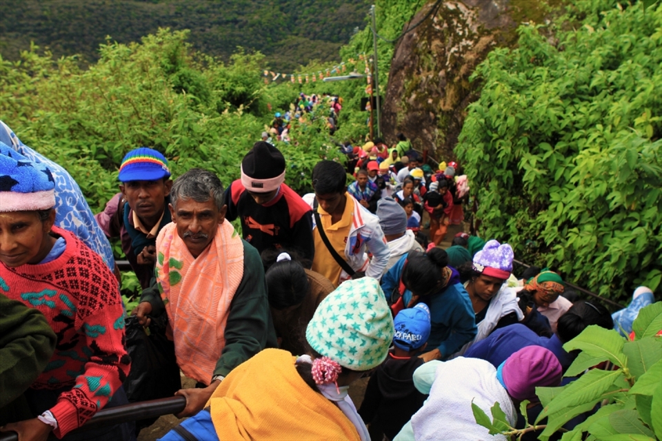 Pilgrims climbing the sacred Sri Pada / Adam's Peak Mountain in their thousands