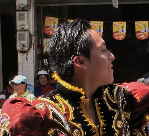 Lively guy dancing in Riobamba Carnival parade