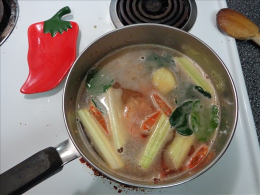 Stock simmering on stove.