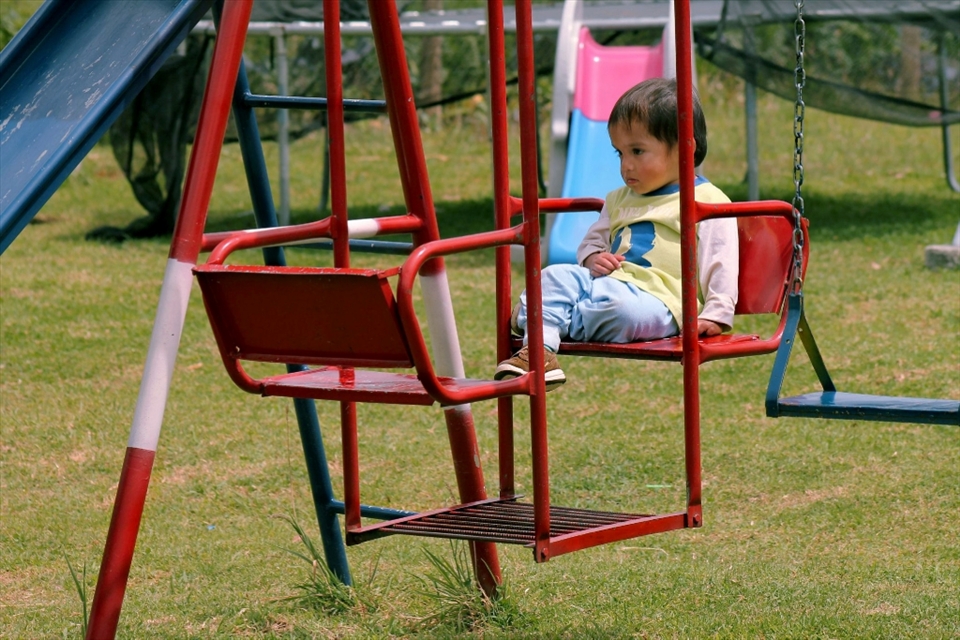 Solitude and lack of attention can be found in the faces of these children. Although they are provided with food and a home, they still need parents to look after them. Sadly, they will not be adopted because of the disease they carry.
