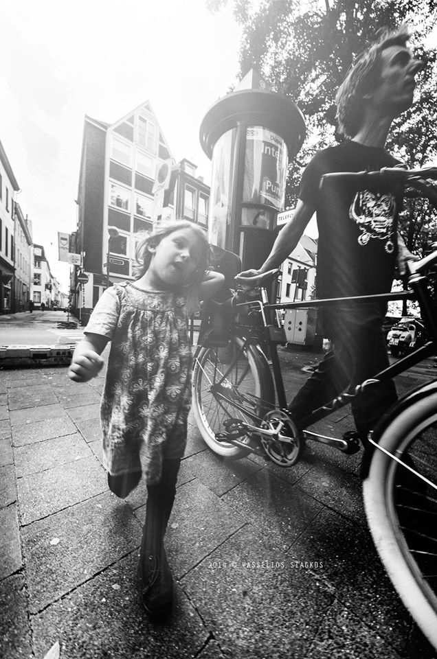 Father and daughter hang around.