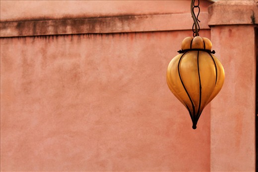 4. a simple hanging lantern reminds  the Arabian influence  of the city and its past as a connection bridge between central Europe and the Orient. And behind again a colourful wall , a variation on the reds, pinks and terracotta that are the theme of the earth colour of Venice