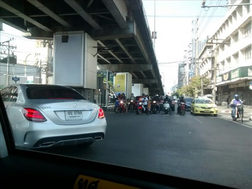Motorbike mania in traffic in northeast Bangkok