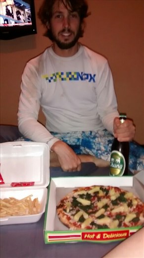 Joe disappears and comes back with pizza and french fries in Chiang Mai - what a great traveling companion I have :)