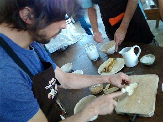 Joe cutting up his bananas for his dessert course