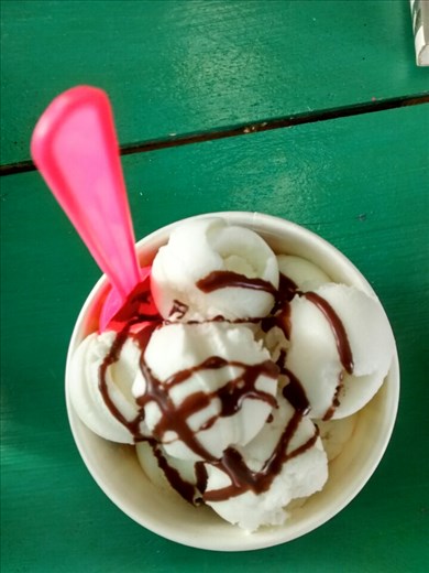 Joe's favorite dessert - coconut icecream from street cart that goes all over city with a bell to let you know they are coming. Yum!