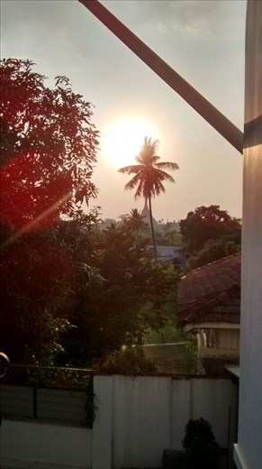 Sunset view from dinner at pizza place (we splurged for western food as we were just getting over being sick) - Beautiful view of Schwedagon Pagoda in Yangon