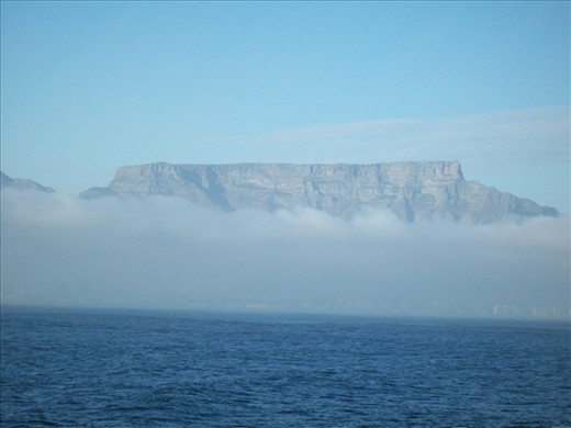On the ferry to Robben Island  with cloud covering Cape Town with Table mountain looking phenomenal