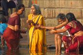 A woman taking a ritual bath at the Ganges river, India.: by viajerastresletras, Views[1068]