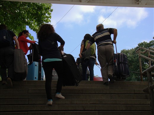 Every trip begins with heavy bags- People in hurry to get on their train