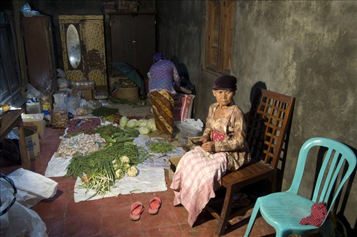 1. Behind the scenes of a traditional Javan wedding ceremony, the kitchen is the busiest place to be. A moment captured when a wedding camera team member came and helped me to light up a dark scenery. Taken in Tawangsari, Jawa Tengah, Indonesia, january of 2012. Technical equipment: Nikon D50, lens AF-S DX NIKKOR ED 18-55mm 1:3.5-5.6G, auto exposure