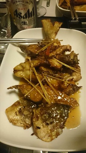 an example of the sauce used on pomfret at a dinner in HK