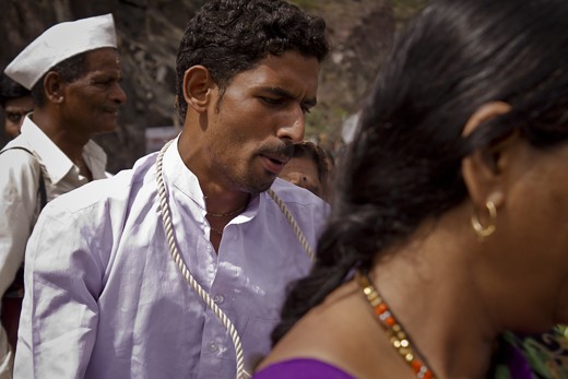 It is impossible not to get carried away by this river of faith. The energy and beaming smiles of these hardened faces is as contagious as it is inspiring.

Here we see a pilgrim lost in devotional songs and performances.