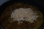 Adding coconut flakes to rendang: by vita_nuova_journal, Views[472]