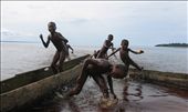Boys playing on the shores of lake Mai Ndombe whilst their mothers and sisters do the laundry nearby.: by vitalsigns, Views[2228]