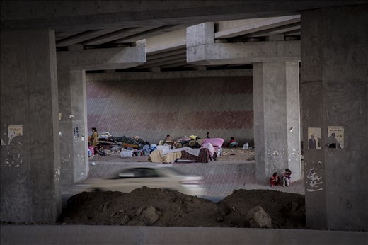 Yazidi families live meters away from a dual carriageway.