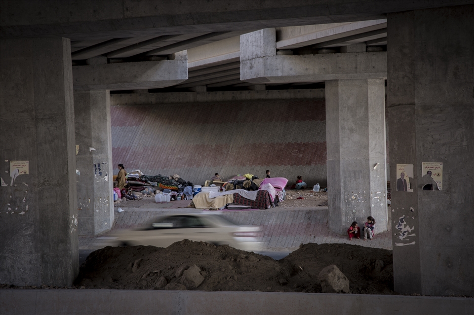 Yazidi families live meters away from a dual carriageway.