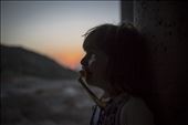 A Yazidi young girl cries inside an unfinished building.: by vlecaer, Views[225]
