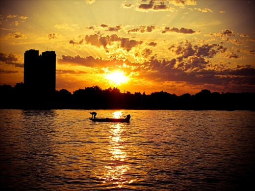 At the golden hour, the lonely fisherman have fight for life, Belgrade, Serbia.