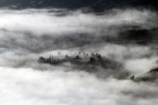 temple in fog blanket