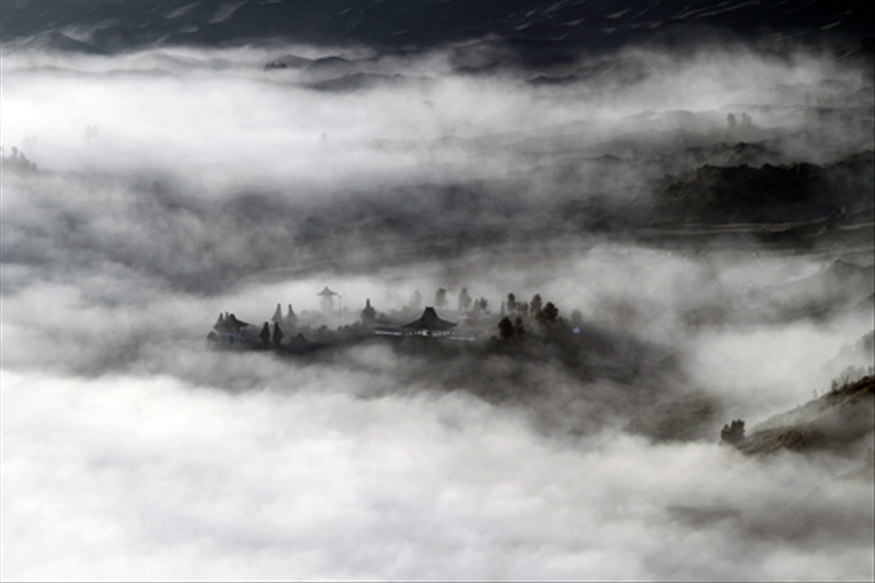 temple in fog blanket