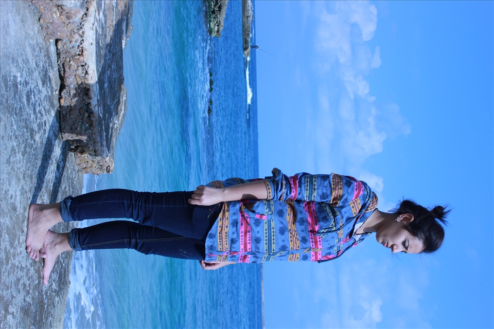 Standing before the sea