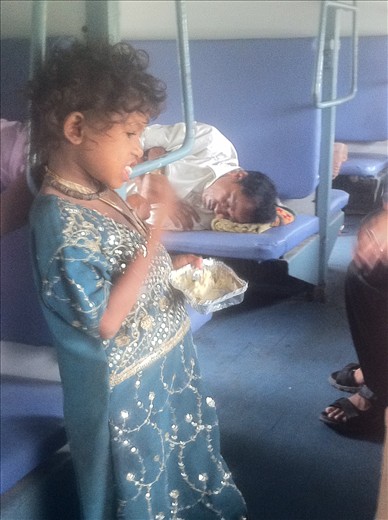 During a long Indian train ride we witnessed some of the poor children feeding off leftovers - India the place of contrast.