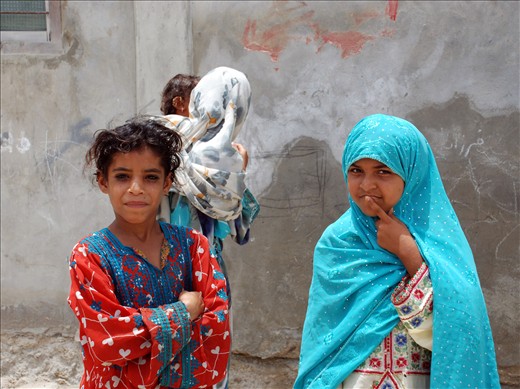 2 girls with a clear paradox looking at the camera!