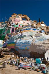 Outside an unfinished section of the mountain are the paints used by the artist, Leonard Knight.: by waynerd, Views[322]