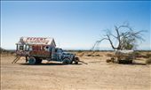 An old truck and shade structure with a bed, both used as areas of refuge from the hot desert sun for by Leonard when needing a break during his building.: by waynerd, Views[471]