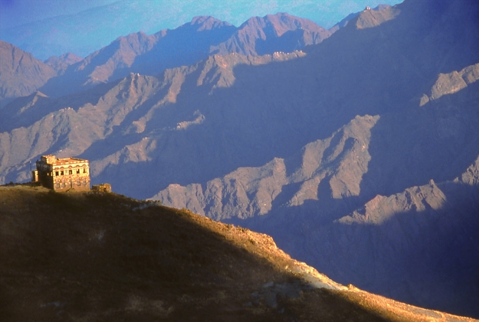 Sun sets on the last house of the village, high in the Hajaz mountains. Other tiny villages sit precariously on faraway ridges. These remote outposts offer protection from the rapid changes in the Arab world. Whether this a good or bad thing remains to be seen.