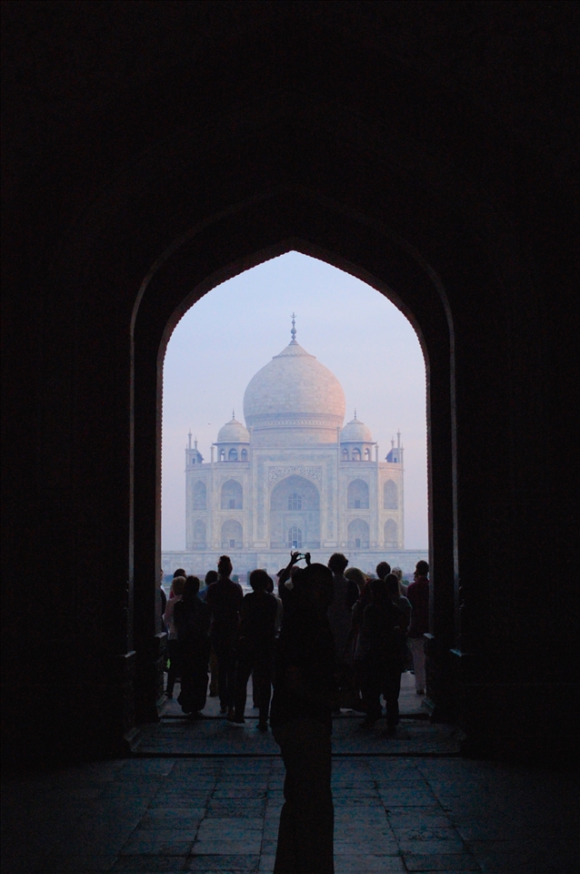 The first glimpse of the Taj Mahal through an appropriately shaped doorway.