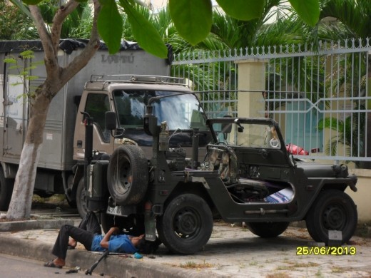 Same street fixing a jeep